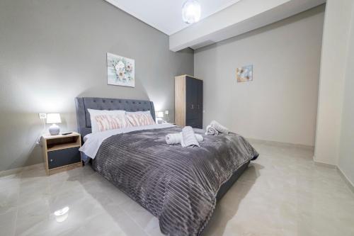 a large bedroom with a large bed in a room at Valia's House in Kalabaka