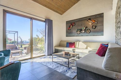 a living room with a couch and a table at Villagio Resort in Zaarour in Zaarour