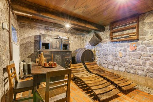 a wine tasting room with a table and chairs at Holiday home in Otocec - Kranjska Krain 26039 in Otočec