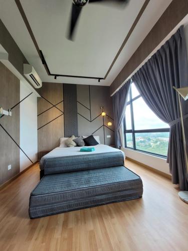 Una cama o camas en una habitación de Umi Studio Imperium Residence