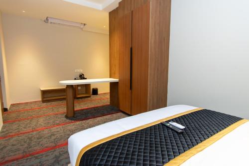 Postel nebo postele na pokoji v ubytování Hotel Sing 65