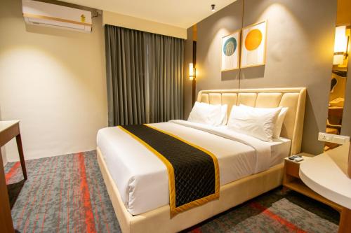 Postel nebo postele na pokoji v ubytování Hotel Sing 65