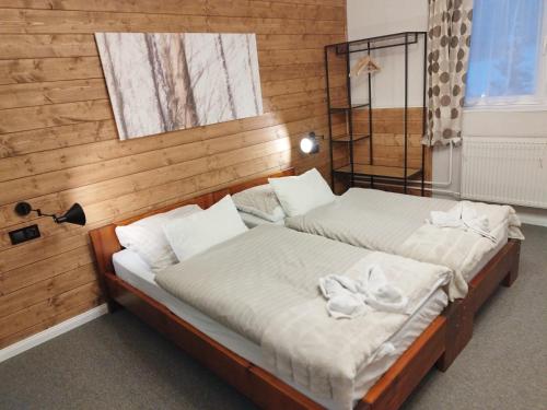 Postel nebo postele na pokoji v ubytování Propaganda Chalet