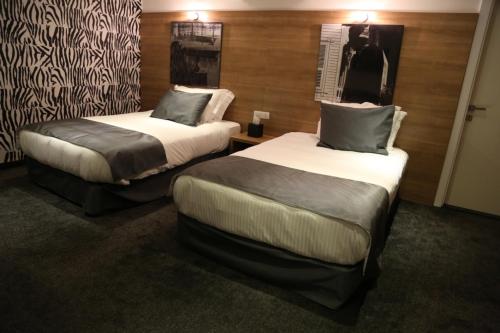 Postel nebo postele na pokoji v ubytování Veer Luxury Boutique Hotel & Beach Club