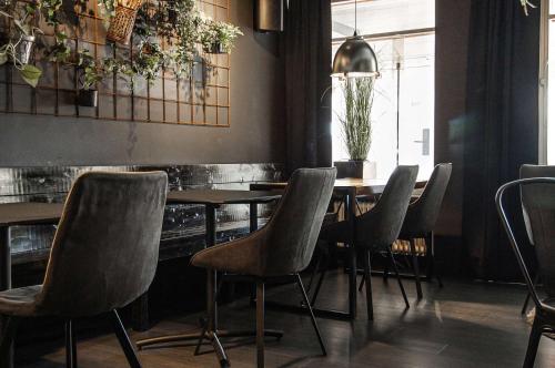 a dining room with a table and chairs at Best Western Hotel Arctic Eden in Kiruna