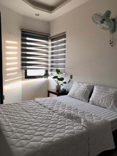 Ένα ή περισσότερα κρεβάτια σε δωμάτιο στο 2001 Motel