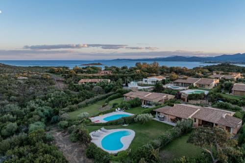 an aerial view of a home with a swimming pool at Villa Saila in Capo Coda Cavallo