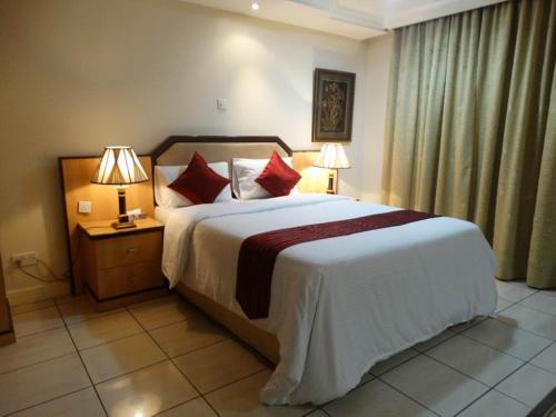 Katil atau katil-katil dalam bilik di Mayfair Hotel