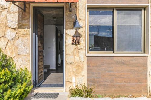 a door to a building with a bell on it at Villagio Resort in Zaarour in Zaarour