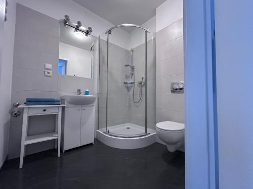 Vonios kambarys apgyvendinimo įstaigoje Apartamenty Sobieski