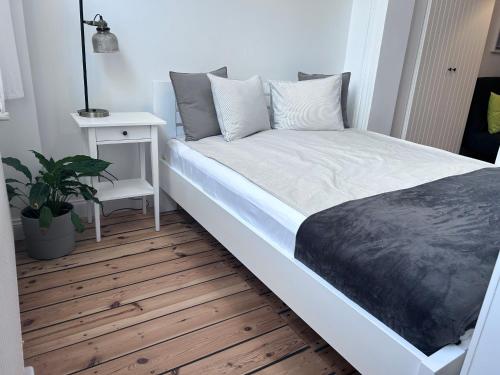 Llit o llits en una habitació de Apartamenty Sobieski