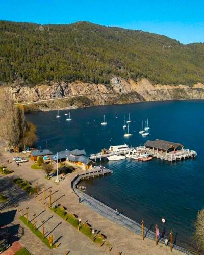 an aerial view of a marina with boats in the water at Hotel Chapelco Ski in San Martín de los Andes