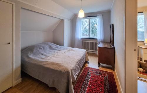 a bedroom with a bed and a dresser and a window at Pet Friendly Home In Vara With Wifi in Vara
