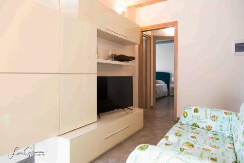 Una cama o camas en una habitación de Dimora La Fiumara
