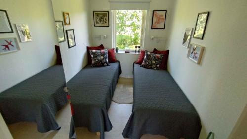 Ein Bett oder Betten in einem Zimmer der Unterkunft Cozy Summerhouse With Spectacular Views!