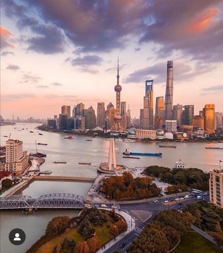 a view of a city with a river and buildings at Dayin Garden Hotel -People's Square & Nanjing Road-Large Social Area -Bar -Café -Gym -Free Laundry Luggage Storage -24H Front Desk-English Service in Shanghai