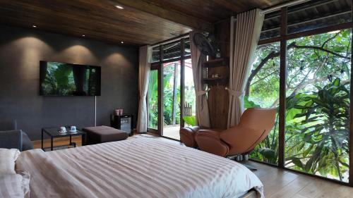TV a/nebo společenská místnost v ubytování Mimoza homestay, Cầu Đất - Đà Lạt