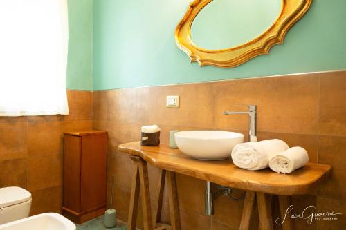 Un baño de Dimora La Fiumara