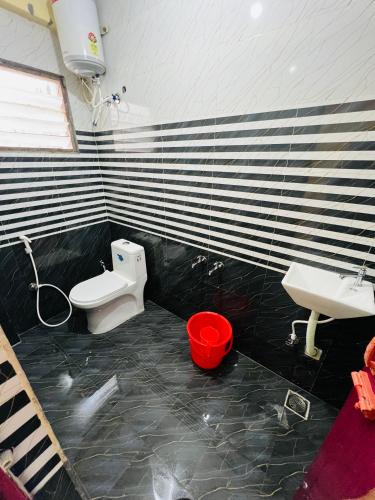 Ένα μπάνιο στο Mookambigai Residency
