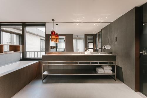 Postel nebo postele na pokoji v ubytování BoHo Hotel Budapest - Small Luxury Hotels