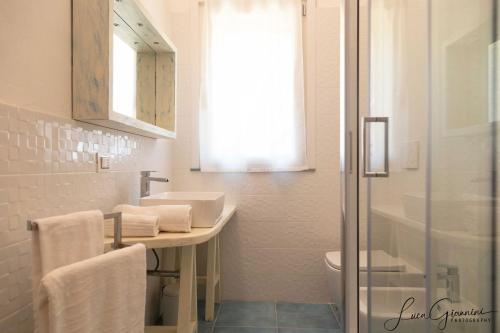 Un baño de Dimora La Fiumara