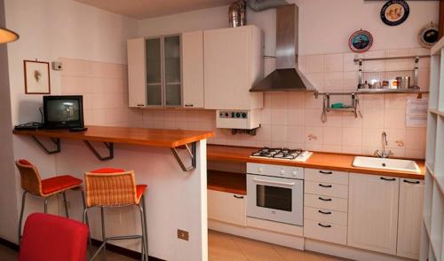 Küche/Küchenzeile in der Unterkunft Appartamento Giardini