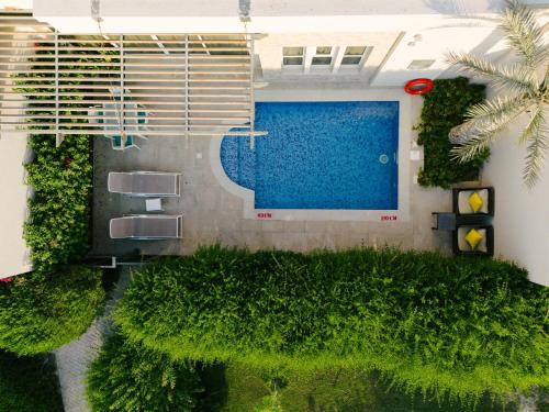 Piscine de l'établissement Simaisma A Murwab Resort ou située à proximité