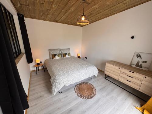 Postel nebo postele na pokoji v ubytování La VillaGeoise