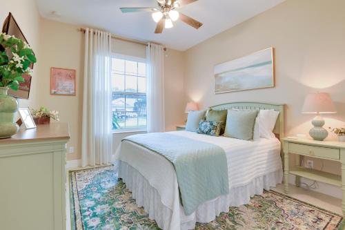 a bedroom with a bed and a window at Stylish Port St Lucie Home with Hot Tub and Game Room! in Walton