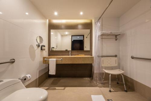 Ванная комната в Hotel Estelar Milla De Oro