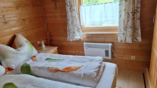 Postel nebo postele na pokoji v ubytování Chalet Siebenschläfer