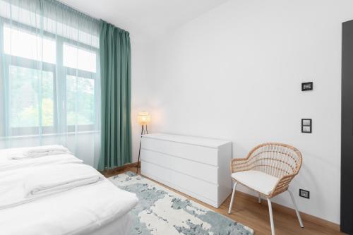Una cama o camas en una habitación de Objev Jeseníky