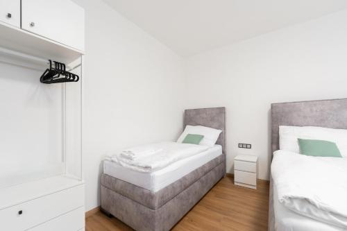 Una cama o camas en una habitación de Objev Jeseníky