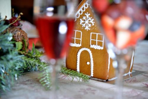 a gingerbread house sitting on top of a table at The Vineyard on Ballito in Ballito