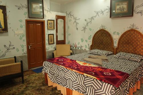 Ένα ή περισσότερα κρεβάτια σε δωμάτιο στο Little prince guest house & homestay