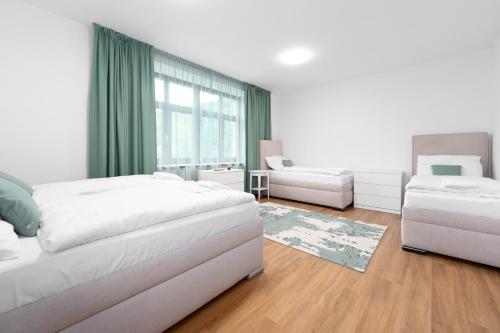 Una cama o camas en una habitación de Objev Jeseníky