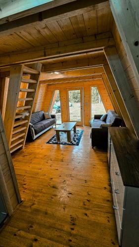 a view of a living room in a log cabin at Camp Danis in Plav
