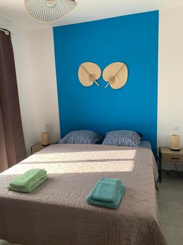Llit o llits en una habitació de Villa SOLEIL