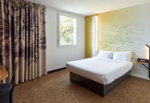 Postel nebo postele na pokoji v ubytování B&B HOTEL Paris Créteil