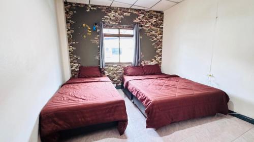 Postel nebo postele na pokoji v ubytování Stay At Moon Hostel Haad Rin