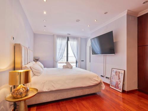 Voodi või voodid majutusasutuse Habitas Stay Barcelona toas