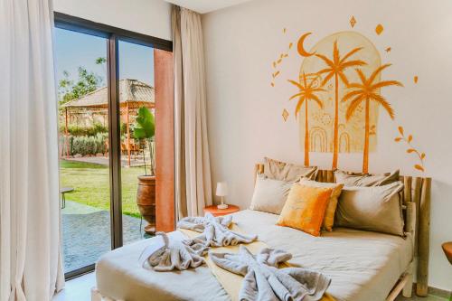 Voodi või voodid majutusasutuse Villa - Piscine chauffée sur demande et gouvernante toas