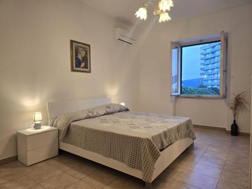 Postel nebo postele na pokoji v ubytování Casina di Alice - Goelba