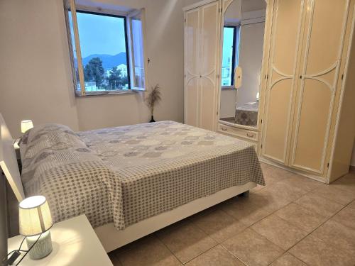 Postel nebo postele na pokoji v ubytování Casina di Alice - Goelba