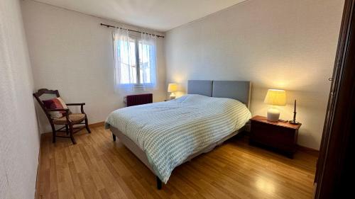 Ένα ή περισσότερα κρεβάτια σε δωμάτιο στο Villa Camélia YourHostHelper