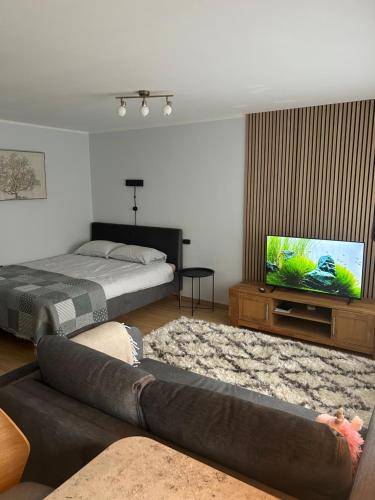 Tempat tidur dalam kamar di GoldNest