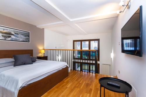 Postel nebo postele na pokoji v ubytování Unforgettable, loft in the city center