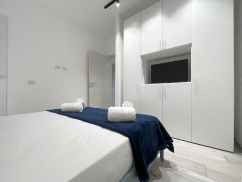 Postel nebo postele na pokoji v ubytování Dione Casa Vacanze Donnalucata - Blu