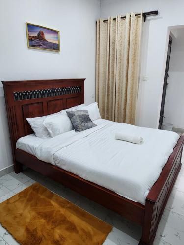 Postel nebo postele na pokoji v ubytování Elysian Homes Villa Naivasha