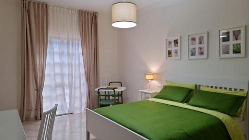 Postel nebo postele na pokoji v ubytování Casa Chilù